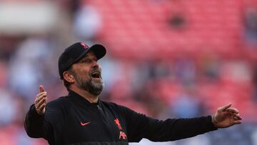 (FILES) In this file photo taken on April 16, 2022 Liverpool's German manager Jurgen Klopp celebrates at the end of the English FA Cup semi-final football match between Liverpool and Manchester City at Wembley Stadium in north west London. - Liverpool FC have announced, April 28, Jurgen Klopp has signed a new Liverpool contract until 2026. (Photo by Adrian DENNIS / AFP) / NOT FOR MARKETING OR ADVERTISING USE / RESTRICTED TO EDITORIAL USE