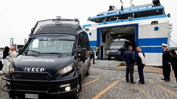 Italian Carabinieri vans leave a ferry at a port as part of additional security measures deployed for G7 Foreign Ministers summit in Capri, Italy, April 15, 2024. REUTERS/Remo Casilli REFILE - CORRECTING YEAR FROM "2023" TO "2024".