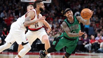 Feb 9, 2017; Portland, OR, USA; Boston Celtics guard Isaiah Thomas (4) reacts while making a pass by Portland Trail Blazers guard Allen Crabbe (23) in the second half at Moda Center. Mandatory Credit: Jaime Valdez-USA TODAY Sports