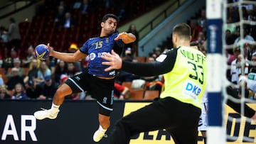 19 January 2023, Poland, Kattowitz: Handball: World Cup, Germany - Argentina, Main Round, Group 3, Matchday 1 at Spodek Katowice. Francisco Andres Lombardi (l) throws against Germany's goalkeeper Andreas Wolff (r). Photo: Jan Woitas/dpa (Photo by Jan Woitas/picture alliance via Getty Images)