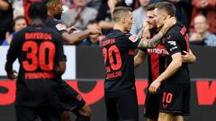 Soccer Football - Bundesliga - Bayer Leverkusen v FC Cologne - BayArena, Leverkusen, Germany - October 8, 2023 Bayer Leverkusen's Jonas Hofmann celebrates scoring their first goal with Florian Wirtz, Alejandro Grimaldo and Jonathan Tah REUTERS/Edith Geuppert DFL REGULATIONS PROHIBIT ANY USE OF PHOTOGRAPHS AS IMAGE SEQUENCES AND/OR QUASI-VIDEO.