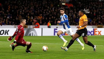 Soccer Football - Europa League - Round of 32 First Leg - Wolverhampton Wanderers v Espanyol - Molineux Stadium, Wolverhampton, Britain - February 20, 2020   Espanyol&#039;s Andres Prieto makes a save from Wolverhampton Wanderers&#039; Adama Traore    REU