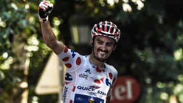 France's Julian Alaphilippe, wearing the best climber's polka dot jersey, celebrates as he crosses the finish line to win the 16th stage of the 105th edition of the Tour de France cycling race, between Carcassonne and Bagneres-de-Luchon, southwe