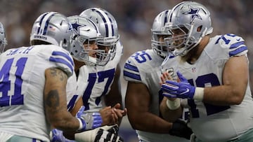 ARLINGTON, TX - NOVEMBER 20: Dak Prescott #4 of the Dallas Cowboys calls a play in the huddle during the second half against the Baltimore Ravens at AT&T Stadium on November 20, 2016 in Arlington, Texas. Ronald Martinez/Getty Images/AFP
== FOR NEWSPAPERS, INTERNET, TELCOS & TELEVISION USE ONLY ==