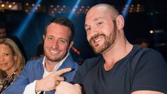 British heavyweight boxing World Champion Tyson Fury (R) 