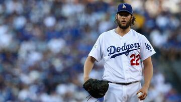 LOS ANGELES, CA - OCTOBER 24: Clayton Kershaw #22 of the Los Angeles Dodgers looks on during the first inning against the Houston Astros in game one of the 2017 World Series at Dodger Stadium on October 24, 2017 in Los Angeles, California.   Tim Bradbury/Getty Images/AFP
 == FOR NEWSPAPERS, INTERNET, TELCOS &amp; TELEVISION USE ONLY ==