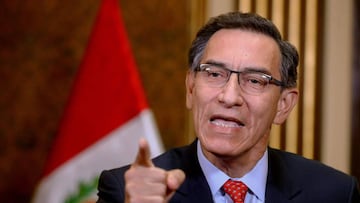 (FILES) In this file photo taken on July 05, 2020 Handout picture released by the Peruvian presidency of President MartxEDn Vizcarra speaking during a televised announcement to the Nation on July 5, 2020, in Lima, to announce he will call for a referendum in 2021 to decide on the elimination of parliamentary immunity. - A debate is set to open in the Peruvian Congress on September 11, 2020 on whether to open impeachment proceedings against President Martin Vizcarra for alleged &quot;moral incapacity&quot;. The debate comes the day after the broadcast of an audio recording of him trying to persuade witnesses to cover up the truth in a corruption probe. Vizcarra denounces &quot;a plot&quot;. (Photo by AndrxE9s Valle / Peruvian Presidency / AFP) / RESTRICTED TO EDITORIAL USE - MANDATORY CREDIT &#039;AFP PHOTO /  PRESIDENCIA DEL PERU - ANDRES VALLE&#039; - NO MARKETING - NO ADVERTISING CAMPAIGNS - DISTRIBUTED AS A SERVICE TO CLIENTS