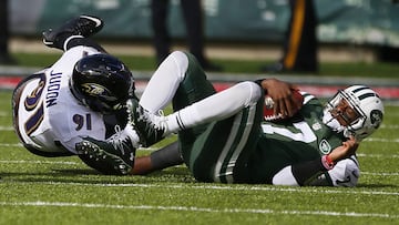 Oct 23, 2016; East Rutherford, NJ, USA; New York Jets quarterback Geno Smith (7) reacts after being sacked by Baltimore Ravens linebacker Matt Judon (91) during first half at MetLife Stadium. Mandatory Credit: Noah K. Murray-USA TODAY Sports