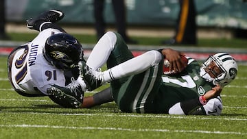 Oct 23, 2016; East Rutherford, NJ, USA;  New York Jets quarterback Geno Smith (7) reacts after being sacked by Baltimore Ravens linebacker Matt Judon (91) during first half at MetLife Stadium. Mandatory Credit: Noah K. Murray-USA TODAY Sports