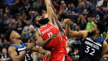 MINNEAPOLIS, MN - APRIL 23: James Harden #13 of the Houston Rockets tips the ball against Jimmy Butler #23 and Karl-Anthony Towns #32 of the Minnesota Timberwolves during the fourth quarter in Game Four of Round One of the 2018 NBA Playoffs on April 23, 2018 at the Target Center in Minneapolis, Minnesota. The Rockets defeated the Timberwolves 119-100. NOTE TO USER: User expressly acknowledges and agrees that, by downloading and or using this Photograph, user is consenting to the terms and conditions of the Getty Images License Agreement.   Hannah Foslien/Getty Images/AFP
 == FOR NEWSPAPERS, INTERNET, TELCOS &amp; TELEVISION USE ONLY ==