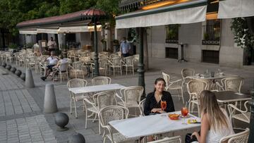 MADRID, SPAIN - JUNE 07: Women sit at the terrace of a restaurant at Opera Square on June 07, 2021 in Madrid, Spain. Spain, the world&#039;s second most visited tourism destination, has re-opened borders to vaccinated visitors worldwide as well as non-vac