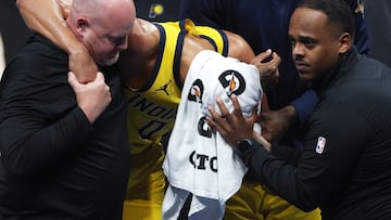 OKLAHOMA CITY, OKLAHOMA - JUNE 22: Tyrese Haliburton #0 of the Indiana Pacers sustains an injury during the first quarter against the Oklahoma City Thunder in Game Seven of the 2025 NBA Finals at Paycom Center on June 22, 2025 in Oklahoma City, Oklahoma. NOTE TO USER: User expressly acknowledges and agrees that, by downloading and or using this photograph, User is consenting to the terms and conditions of the Getty Images License Agreement. Matthew Stockman/Getty Images/AFP (Photo by MATTHEW STOCKMAN / GETTY IMAGES NORTH AMERICA / Getty Images via AFP)