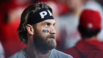 NEW YORK, NEW YORK - SEPTEMBER 20: Bryce Harper #3 of the Philadelphia Phillies looks on from the dugout before the game against the New York Mets at Citi Field on September 20, 2024 in New York City. Dustin Satloff/Getty Images/AFP (Photo by Dustin Satloff / GETTY IMAGES NORTH AMERICA / Getty Images via AFP)