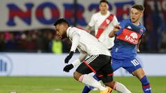 BUENOS AIRES, ARGENTINA - AUGUST 27: Miguel Borja of River Plate dribbles past Lucas Menossi of Tigre during a match between Tigre and River Plate as part of the Liga Profesional 2022 at Jose Dellagiovanna on August 27, 2022 in Buenos Aires, Argentina. (Photo by Daniel Jayo/Getty Images)