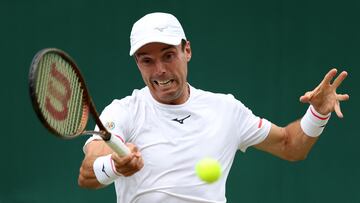 Tennis - Wimbledon - All England Lawn Tennis and Croquet Club, London, Britain - July 5, 2024 Spain's Roberto Bautista Agut in action during his third round match against Italy's Fabio Fognini REUTERS/Paul Childs