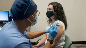 (FILES) In this file photo taken on August 5, 2020, in this image courtesy of the Henry Ford Health System, volunteers are given the Moderna mRNA-1273 Coronavirus Efficacy (COVE), in Detroit, Michigan. - Trucks and cargo planes are at the ready to distrib