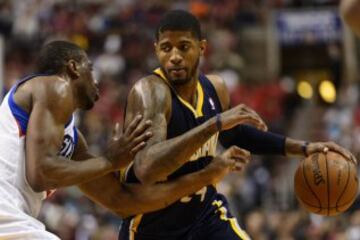 Paul George y Thaddeus Young.