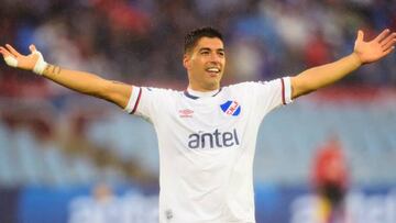 Nacional's forward Luis Suarez celebrates after scoring against Liverpool during the 2022 Uruguayan Championship final match between Nacional and Liverpool at the Centenario stadium in Montevideo, Uruguay, on October 30, 2022. (Photo by Dante Fernandez / Dante Fernandez / AFP) (Photo by DANTE FERNANDEZ/Dante Fernandez/AFP via Getty Images)