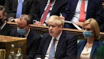 FILE PHOTO: British Prime Minister Boris Johnson attends the weekly Prime Minister's Questions at the parliament in London, Britain, January 12, 2022. UK Parliament/Jessica Taylor/Handout via REUTERS THIS IMAGE HAS BEEN SUPPLIED BY A THIRD PARTY. MANDATORY CREDIT. NO ALTERATIONS/File Photo