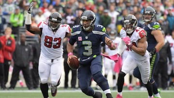 Oct 16, 2016; Seattle, WA, USA; Seattle Seahawks quarterback Russell Wilson (3) carries the ball against the Atlanta Falcons during a NFL football game at CenturyLink Field. The Seahawks defeated the Falcons 26-24. Mandatory Credit: Kirby Lee-USA TODAY Sports