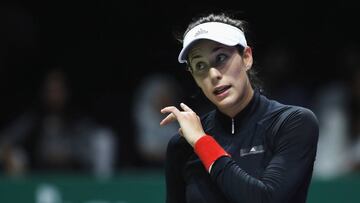SINGAPORE - OCTOBER 24: Garbine Muguruza of Spain looks dejected in her singles match against Karolina Pliskova of Czech Republic during day 3 of the BNP Paribas WTA Finals Singapore presented by SC Global at Singapore Sports Hub on October 24, 2017 in Singapore. (Photo by Julian Finney/Getty Images for WTA)