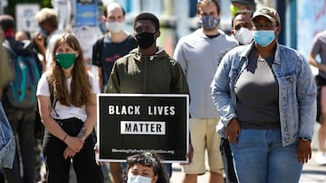 People listen to speakers in the newly created Capitol Hill Autonomous Zone (CHAZ), in Seattle, Washington on June 11, 2020. 