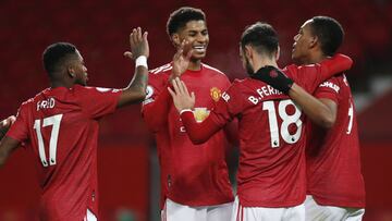 Manchester United&#039;s Bruno Fernandes, 2nd right, celebrates his side&#039;s sixth goal from a penalty kick with team mates during an English Premier League soccer match between Manchester United and Leeds United at the Old Trafford stadium in Manchest