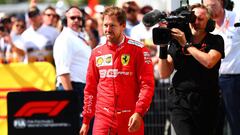 MONTREAL, QC - JUNE 09: Sebastian Vettel of Germany and Ferrari walks in to parc ferme to swap the 1st and 2nd place boards after the F1 Grand Prix of Canada at Circuit Gilles Villeneuve on June 9, 2019 in Montreal, Canada.   Dan Istitene/Getty Images/AFP
 == FOR NEWSPAPERS, INTERNET, TELCOS &amp; TELEVISION USE ONLY ==