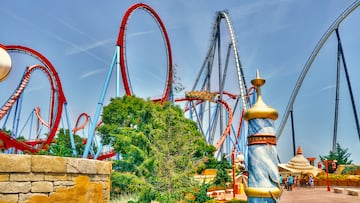 Salou, Spain - July 18, 2015: Dragon Khan and Shambhala attractions in PortAventura, is a theme park and a resort in the south of Barcelona, in Salou, Tarragona. It attracts around 4 million visitors per year making it the most visited theme park in Spain and 6th in Europe