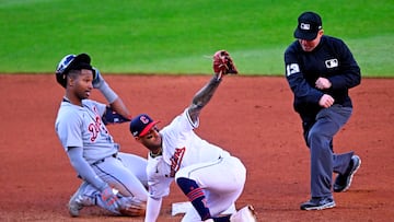 Cleveland Guardians shortstop Brayan Rocchio (4) tags outs Detroit Tigers outfielder Justyn-Henry Malloy (44) at second base