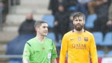 Piqué, con Undiano.