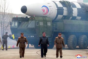 North Korean leader Kim Jong Un walks away from what state media report is a &quot;new type&quot; of intercontinental ballistic missile (ICBM) in this undated photo released on March 24, 2022 by North Korea&#039;s Korean Central News Agency (KCNA). KCNA via REUTERS    ATTENTION EDITORS - THIS IMAGE WAS PROVIDED BY A THIRD PARTY. REUTERS IS UNABLE TO INDEPENDENTLY VERIFY THIS IMAGE. NO THIRD PARTY SALES. SOUTH KOREA OUT. NO COMMERCIAL OR EDITORIAL SALES IN SOUTH KOREA.     TPX IMAGES OF THE DAY