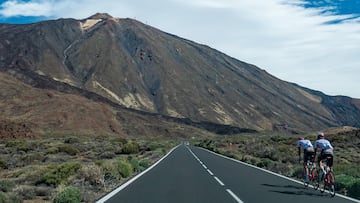 Cyclist on a road with a bicycle, bike cycling during a blue sky summer day on the famous for biking route around the volcanic landscape of El Teide Volcano and National Park in Tenerife island, Canary Islands, Spain (Photo by Nicolas Economou/NurPhoto via Getty Images)
