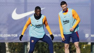 Soccer Football - FC Barcelona Training - Ciutat Esportiva Joan Gamper, Barcelona, Spain - January 22, 2022 FC Barcelona's Ousmane Dembele and Clement Lenglet during training REUTERS/Albert Gea