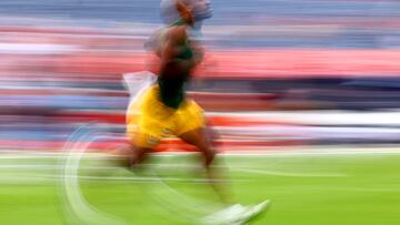 DENVER, COLORADO - AUGUST 18: AJ Dillon #28 of the Green Bay Packers warms up against the Denver Broncos before a preseason game at Empower Field At Mile High on August 18, 2024 in Denver, Colorado. Jamie Schwaberow/Getty Images/AFP (Photo by Jamie Schwaberow / GETTY IMAGES NORTH AMERICA / Getty Images via AFP)