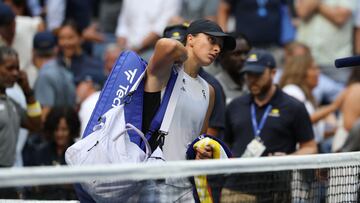 Poland's Iga Swiatek walks off the court after losing to USA's Amanda Anisimova in their women's singles quarterfinal tennis match on day eleven of the US Open tennis tournament at the USTA Billie Jean King National Tennis Center in New York City, on September 3, 2025. (Photo by TIMOTHY A. CLARY / AFP)