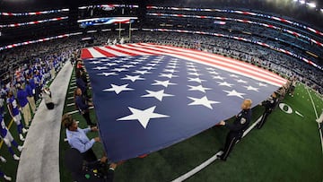 ARLINGTON, TEXAS - NOVEMBER 30: A general view of the American flag during the national anthem prior to the game between the Seattle Seahawks and theDallas Cowboys at AT&T Stadium on November 30, 2023 in Arlington, Texas.   Ron Jenkins/Getty Images/AFP (Photo by Ron Jenkins / GETTY IMAGES NORTH AMERICA / Getty Images via AFP)