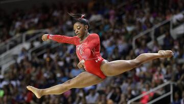 SAN JOSE, CA - JULY 10: Simone Biles competes in the floor exercise during Day 2 of the 2016 U.S. Women&#039;s Gymnastics Olympic Trials at SAP Center on July 10, 2016 in San Jose, California.   Ezra Shaw/Getty Images/AFP
 == FOR NEWSPAPERS, INTERNET, TELCOS &amp; TELEVISION USE ONLY ==