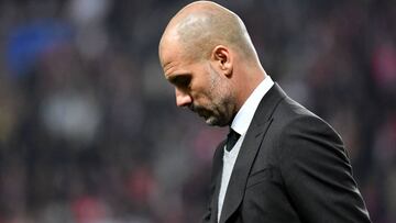 Manchester City's Spanish manager Pep Guardiola reacts during the UEFA Champions League round of 16 football match between Monaco and Manchester City at the Stade Louis II in Monaco on March 15, 2017. / AFP PHOTO / Pascal GUYOT