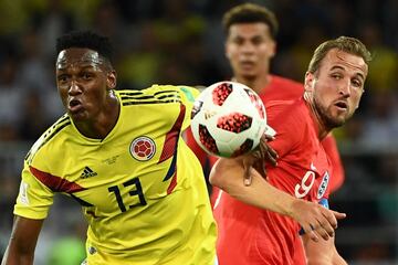 Yerry Mina y Harry Kane.