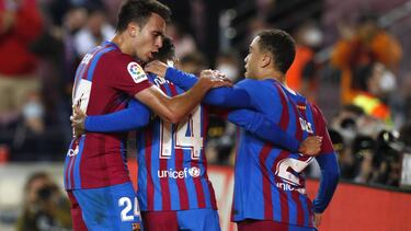 Soccer Football - LaLiga - FC Barcelona v Valencia - Camp Nou, Barcelona, Spain - October 17, 2021 FC Barcelona's Philippe Coutinho celebrates scoring their third goal with Eric Garcia and Sergino Dest REUTERS/Albert Gea