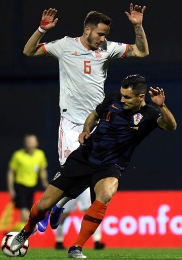 Lovren y Saúl.