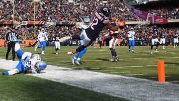 Nov 11, 2018; Chicago, IL, USA; Chicago Bears wide receiver Allen Robinson (12) attempts to leap for a touchdown against Detroit Lions free safety Glover Quin (27) during the first quarter at Soldier Field. Mandatory Credit: Mike DiNovo-USA TODAY Sports
