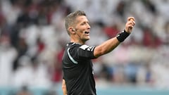 Italian referee Daniele Orsato gestures during the Qatar 2022 World Cup Group A football match between Qatar and Ecuador at the Al-Bayt Stadium in Al Khor, north of Doha on November 20, 2022. (Photo by Glyn KIRK / AFP)