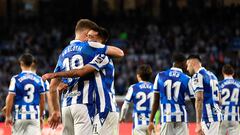 Real Sociedad's Norwegian forward Alexander Sorloth (L) celebrates with Real Sociedad's Spanish midfielder Brais Mendez after scoring his team's second goal during the Spanish League football match between Real Sociedad and CA Osasuna at the Anoeta stadium in San Sebastian on December 31, 2022. (Photo by ANDER GILLENEA / AFP)