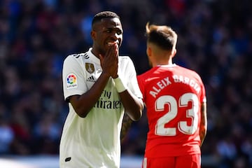 Real Madrid's Brazilian forward Vinicius Junior reacts after missing a goal opportunity during the Spanish League football match between Real Madrid and Girona at the Santiago Bernabeu stadium in Madrid on February 17, 2019.