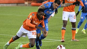 Feb 16, 2022; Hamilton, Ontario, Canada; Forge FC defender Aboubakar Sissoko (33) challenges for the ball with Cruz Azul forward Chirstian Tabo (11) in the first half of a CONCACAF Champions League game at Tim Hortons Field. Mandatory Credit: Dan Hamilton