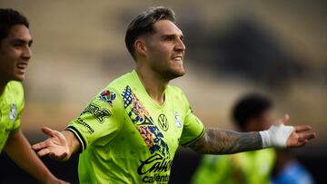 Puebla's Uruguayan forward #11 Emiliano Gomez celebrates after scoring during the Liga MX Clausura football match between Cruz Azul and Puebla at the Olimpico Universitario stadium in Mexico City on January 25, 2025. (Photo by Rodrigo Oropeza / AFP)