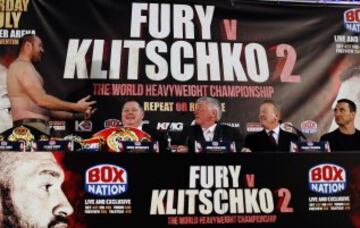 Boxing - Tyson Fury & Wladimir Klitschko Head-to-Head Press Conference - Manchester Arena - 27/4/16
Tyson Fury with his shirt off with Promoter Mick Hennessy, commentator John Rawling, Promoter Frank Warren and Wladimir Klitschko (R) during the head to head press conference
Action Images via Reuters / Lee Smith
Livepic
EDITORIAL USE ONLY.