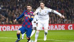 BARCELONA, SPAIN - DECEMBER 18: Lionel Messi of FC Barcelona competes for the ball with Sergio Ramos of Real Madrid during the Liga match between FC Barcelona and Real Madrid CF at Camp Nou on December 18, 2019 in Barcelona, Spain. (Photo by Quality Sport